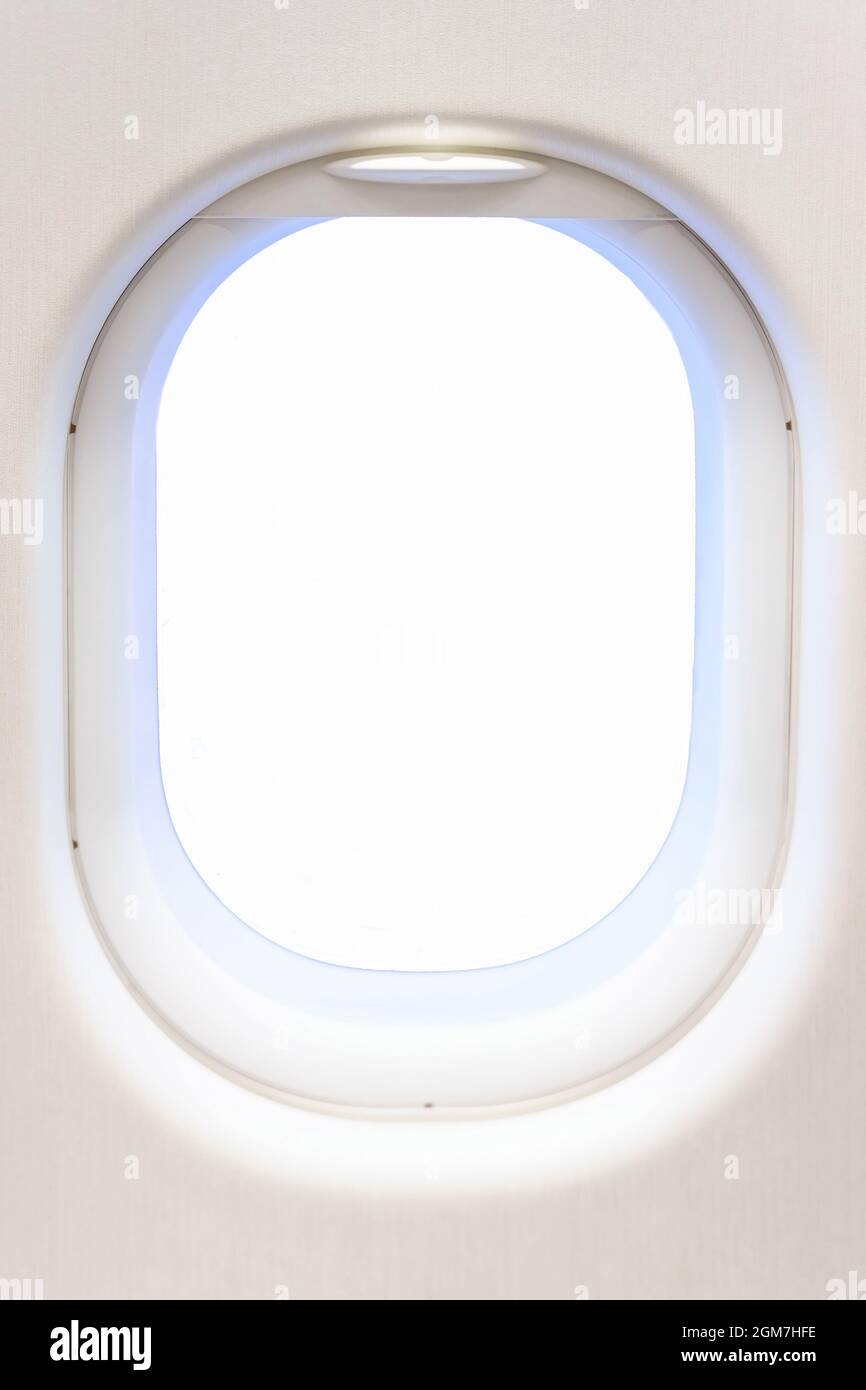 Fenêtre de l'avion depuis l'intérieur de l'avion. Modèle de voyage d'affaires pour vos idées de vue à travers le hublot avec le chemin de coupure Banque D'Images