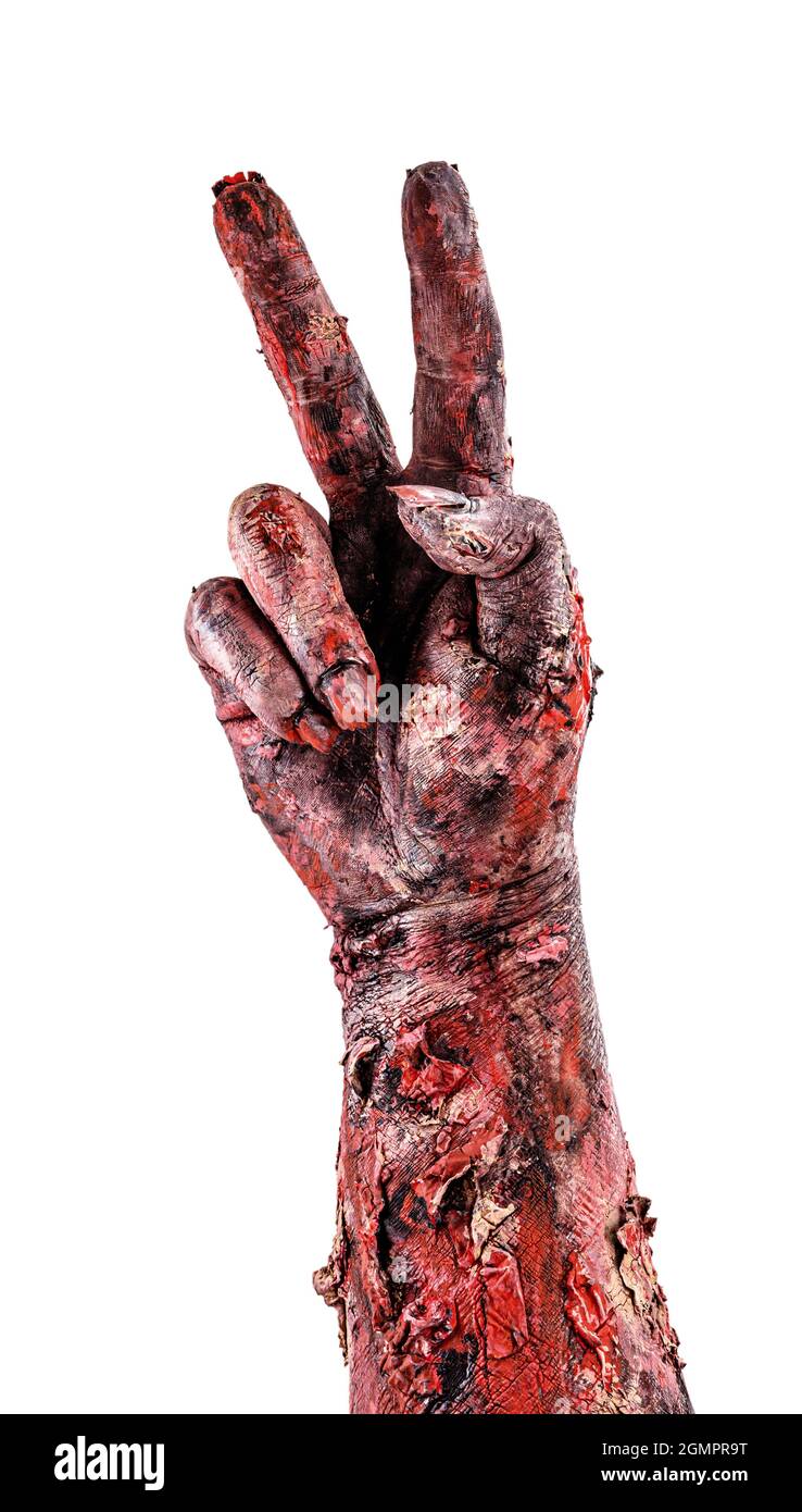 main zombie avec deux doigts, compte à rebours ou signe de victoire, arrière-plan blanc isolé. Banque D'Images