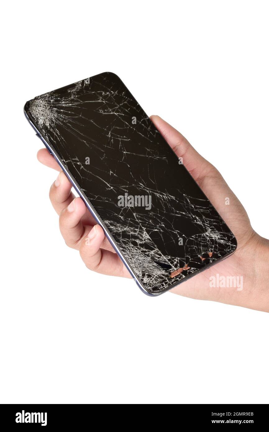smartphone à écran cassé à la main isolé sur fond blanc avec chemin d'écrêtage, smartphone à écran cassé Banque D'Images