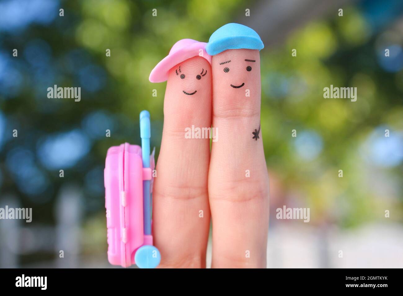 L'art des doigts du couple heureux. Homme et femme en vacances Photo Stock  - Alamy