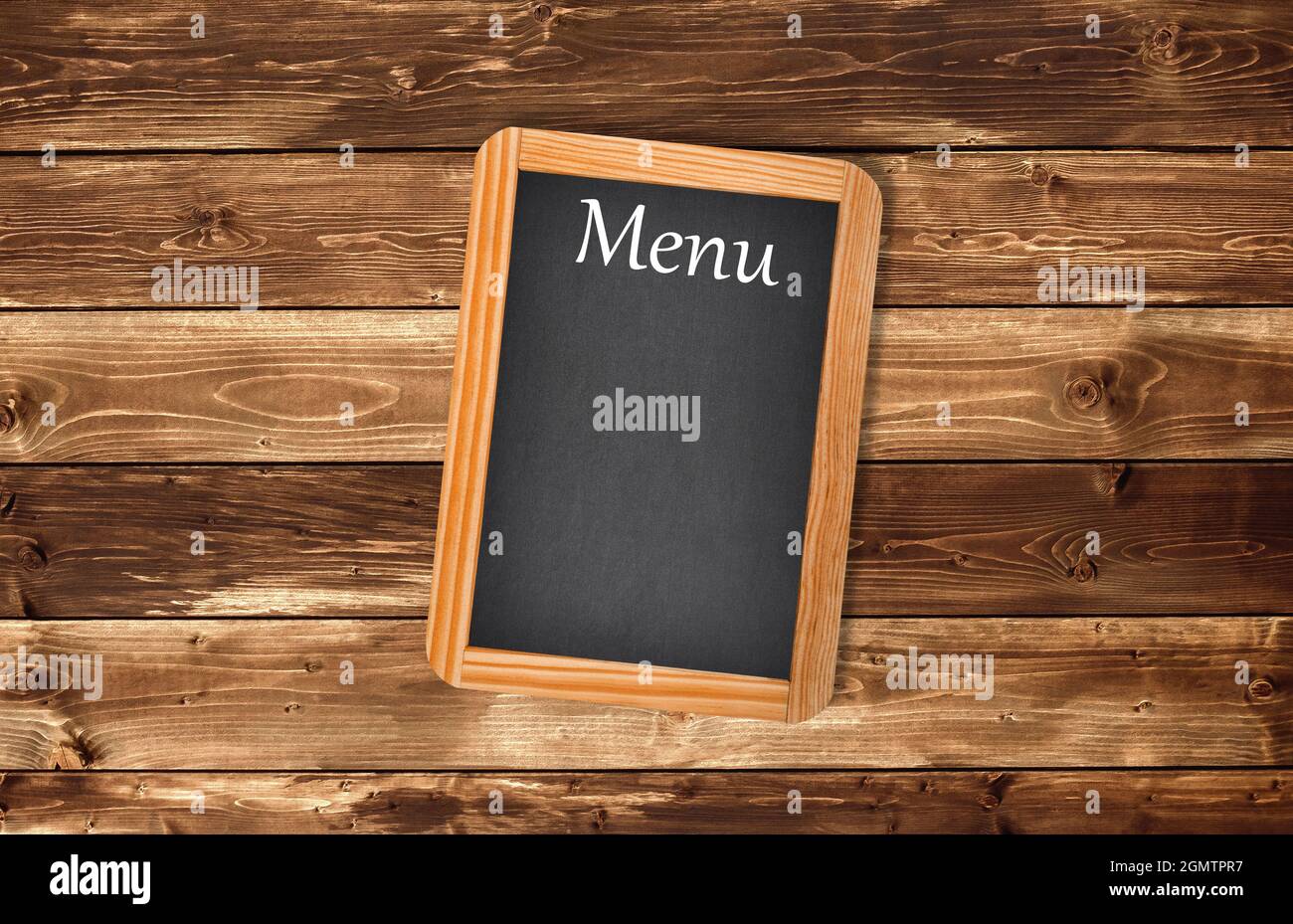 Menu vieilli Tableau noir sur un mur en bois Banque D'Images
