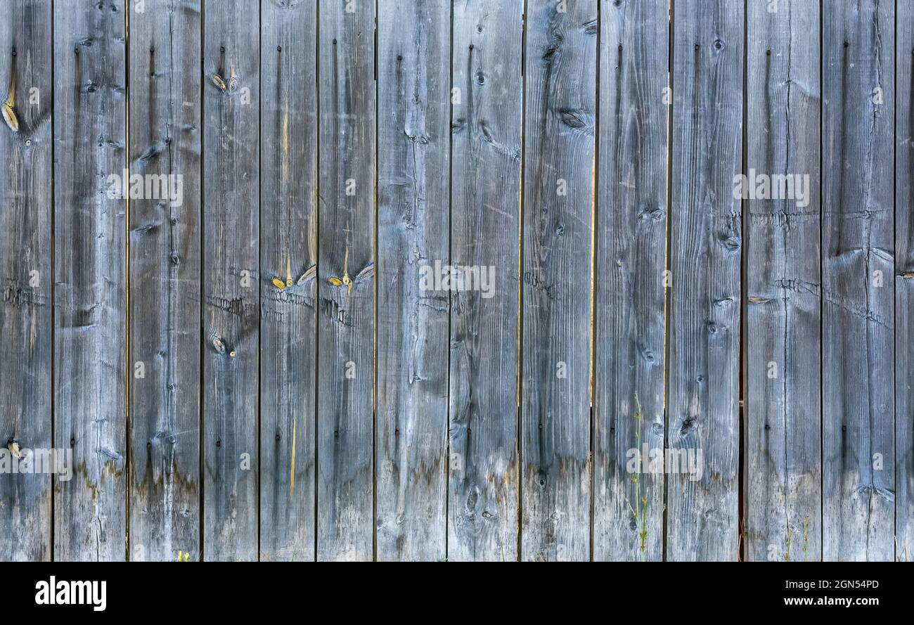 La surface texturée d'une clôture en bois. Noirci de temps en temps Photo  Stock - Alamy