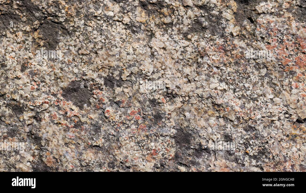 Surface en granit. Texture de pierre de granit. Surface en pierre naturelle fissurée. Copier l'espace Banque D'Images
