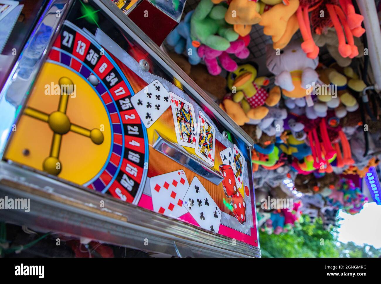 Machine à pièces de monnaie équipée d'un jeu de cartes Banque D'Images