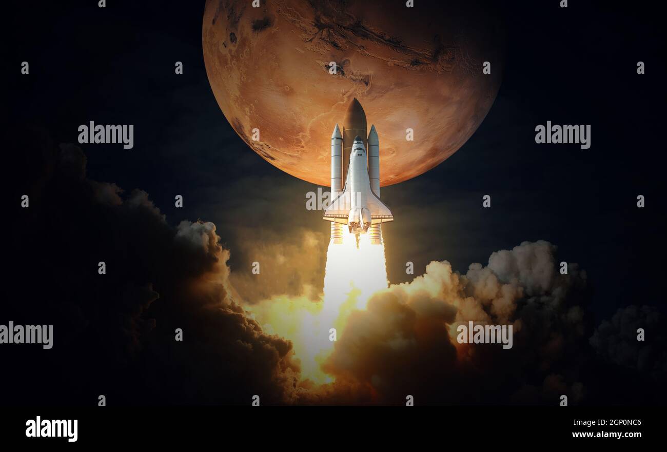 La navette spatiale démène à mars.Éléments de cette image fournis par la NASA. Banque D'Images