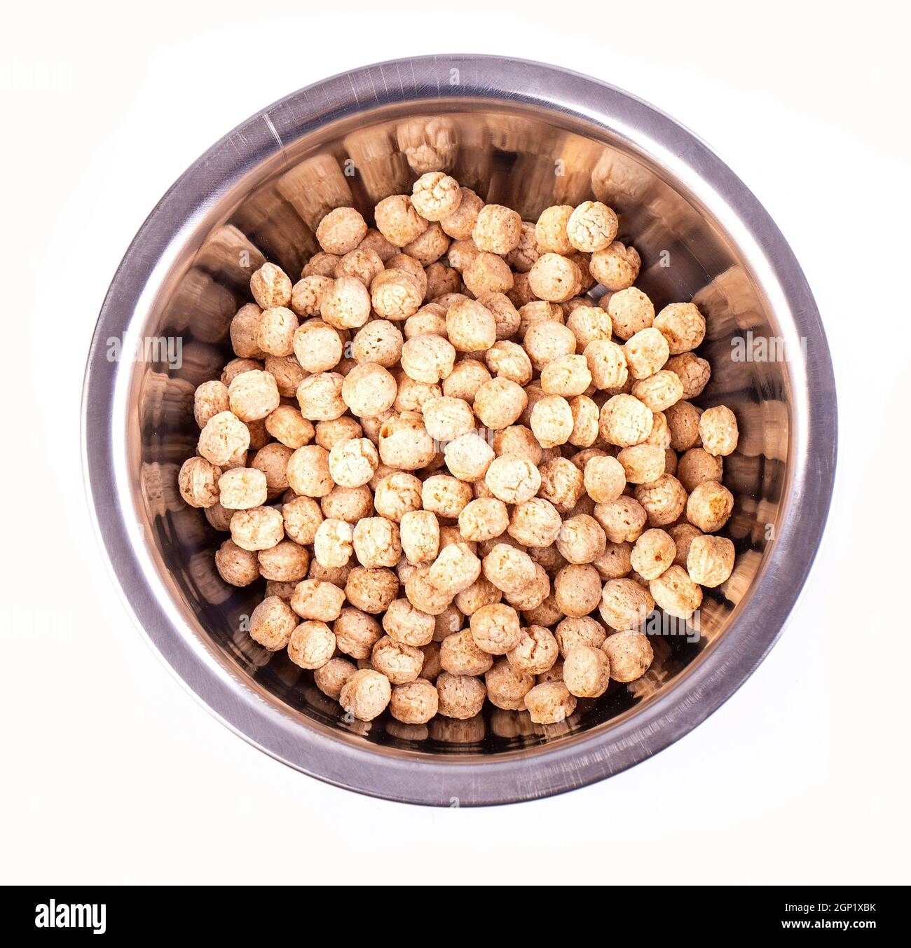 Piles d'enfants de grains entiers pâles sur la plaque Banque D'Images