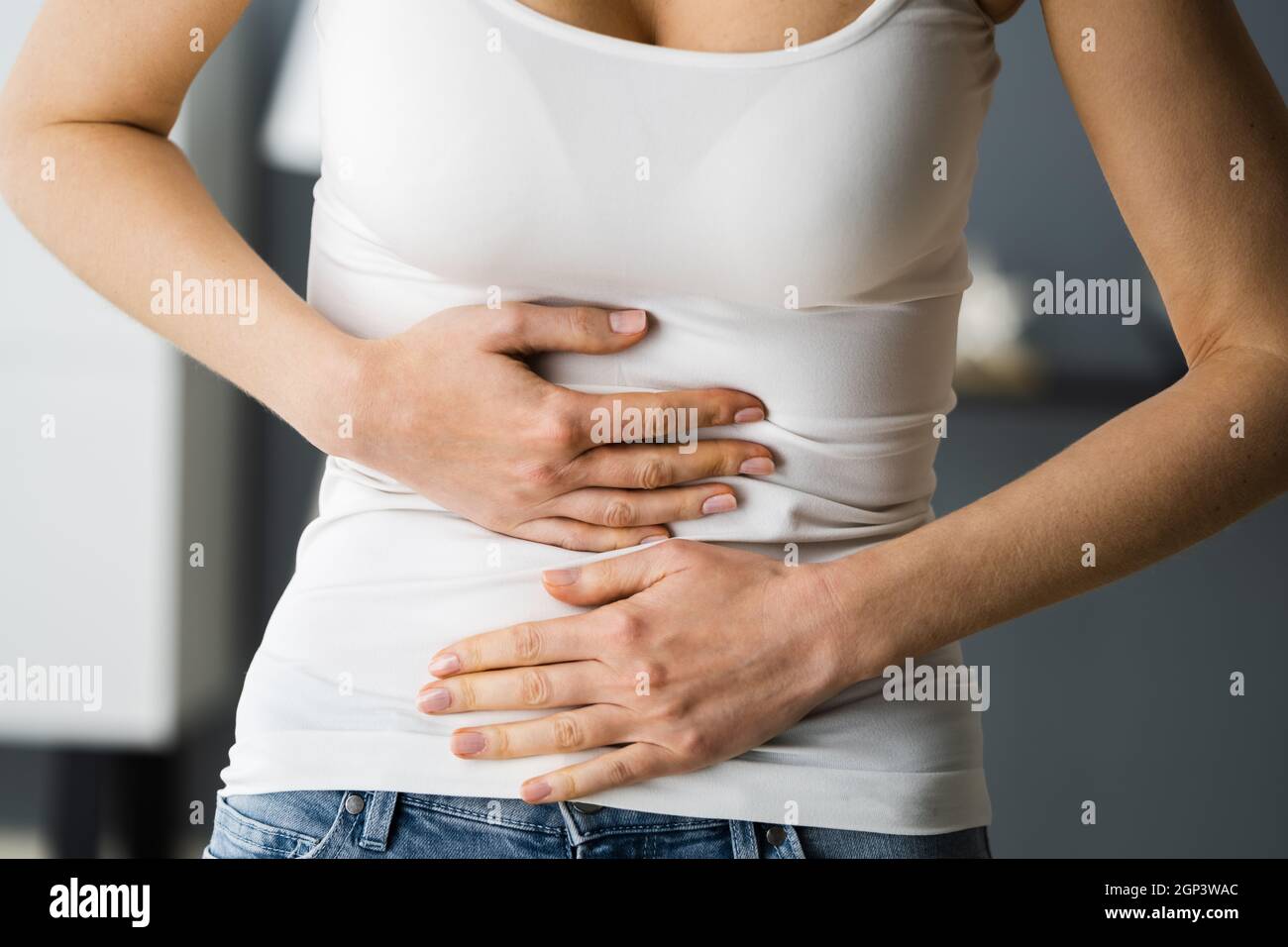 Incontinence, constipation, ménopause ou douleur à l'estomac PMS Banque D'Images