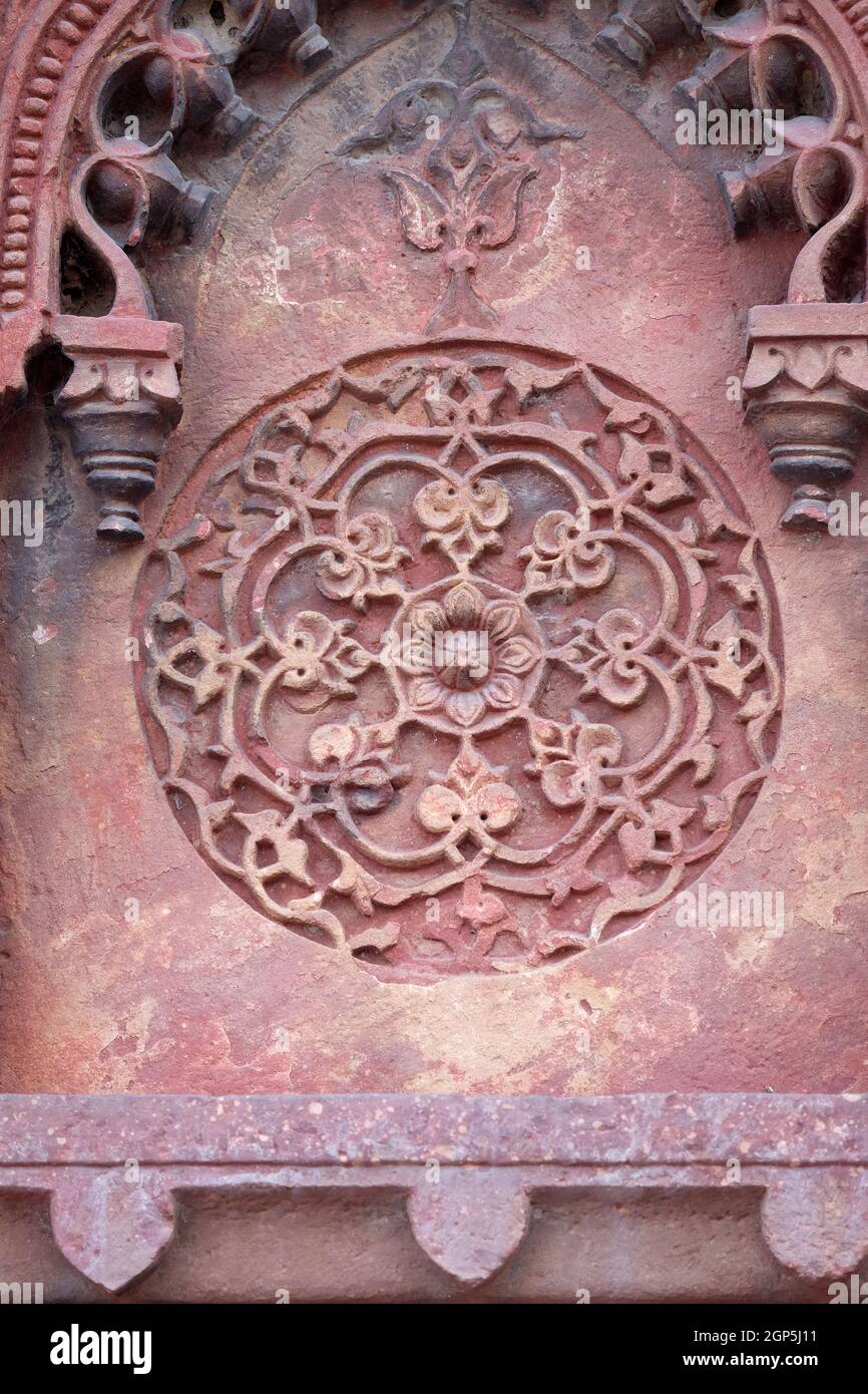 Motif en pierre sur un mur du temple à Red fort, Agra, site classé au patrimoine mondial de l'UNESCO, Inde Banque D'Images