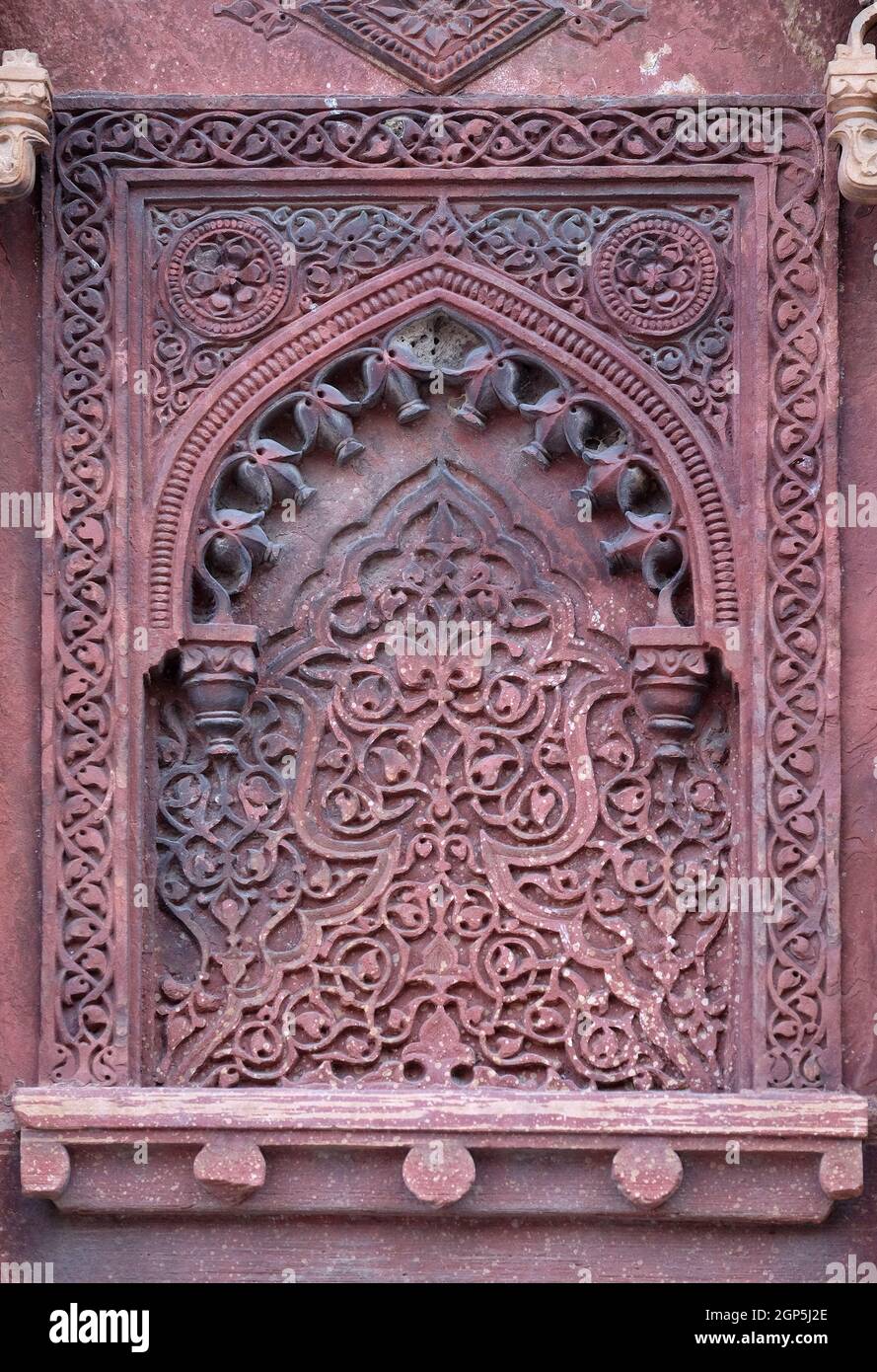 Motif en pierre sur un mur du temple à Red fort, Agra, site classé au patrimoine mondial de l'UNESCO, Inde Banque D'Images