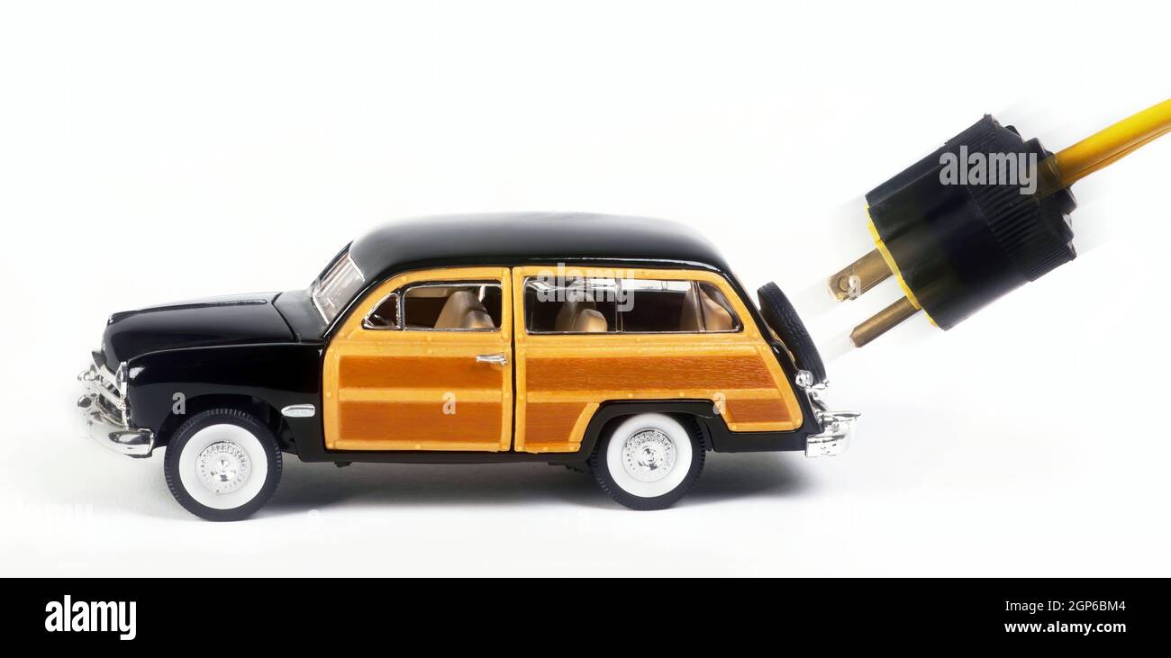Charge EV de voiture électrique avec prise électrique. Banque D'Images