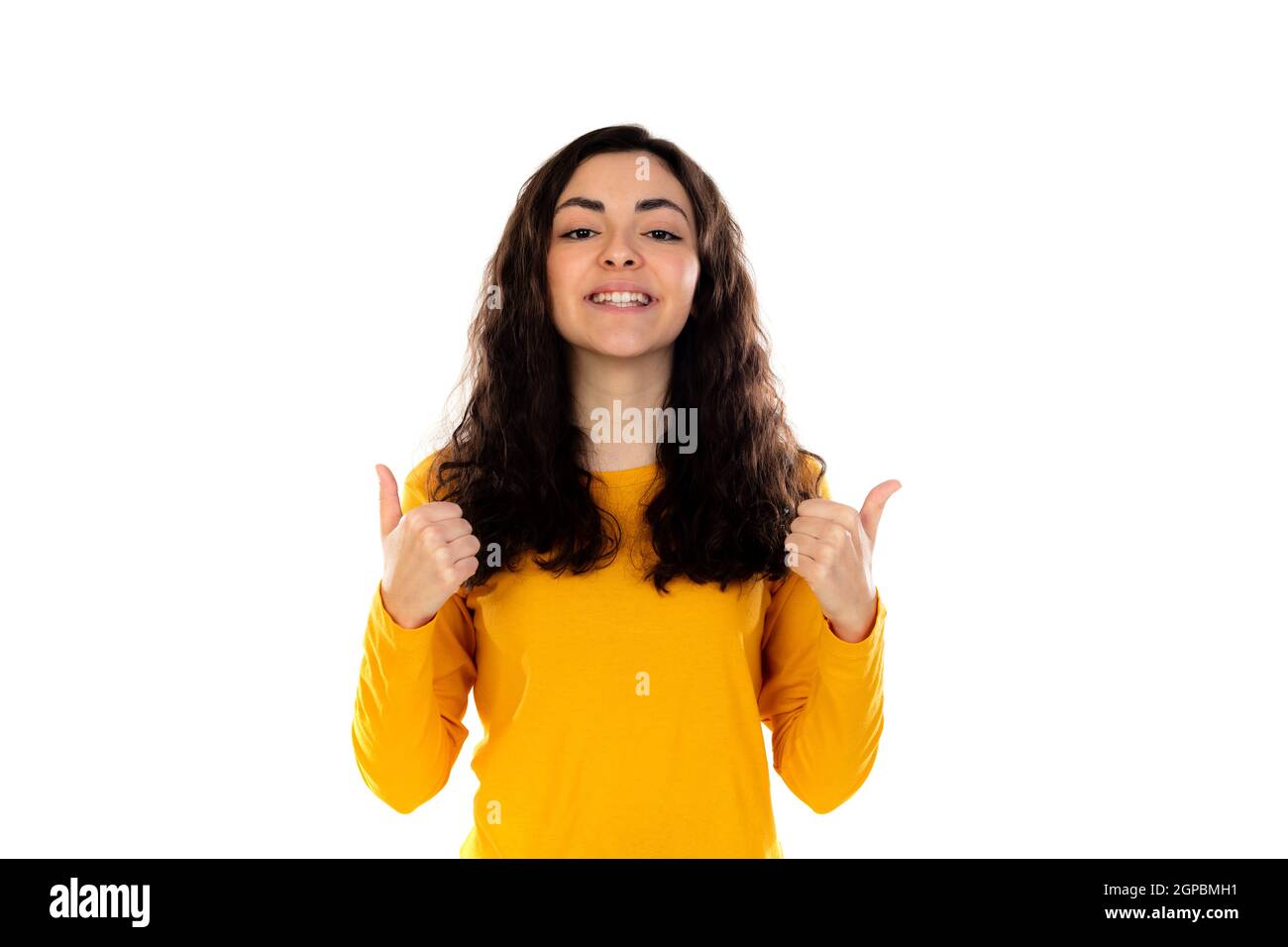 Adorable jeune fille avec chandail jaune isolé sur un blanc arrière-plan Banque D'Images