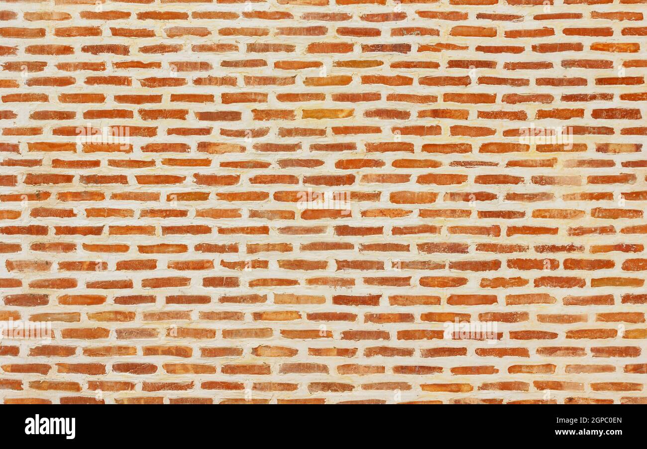 Belle texture de mur de brique avec joints de ciment blanc, fond de brique Banque D'Images