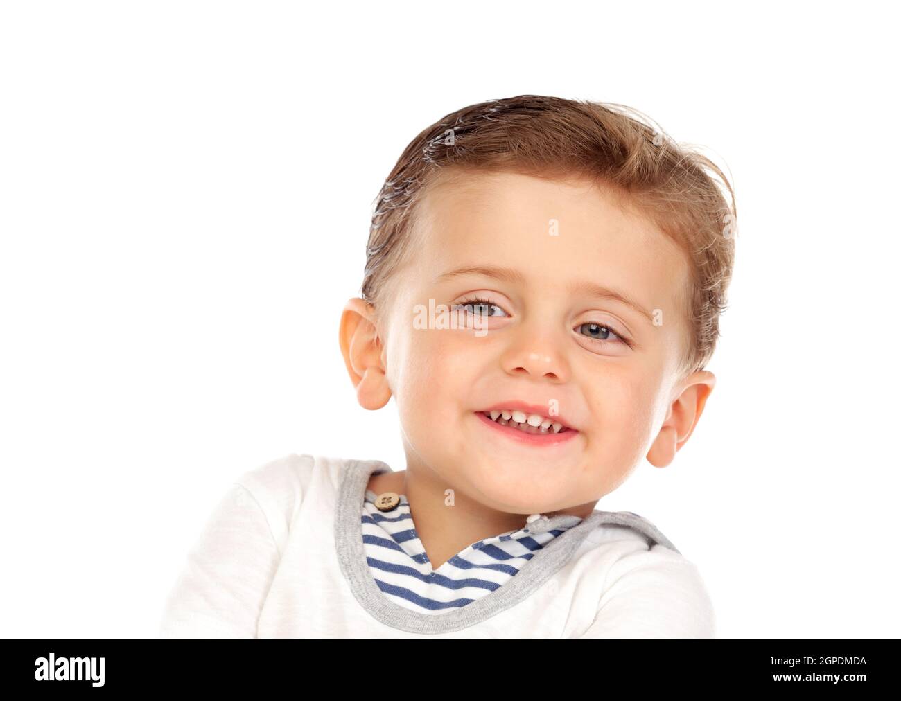 Belle petite enfant deux ans aux cheveux blonds isolé sur fond blanc Banque D'Images