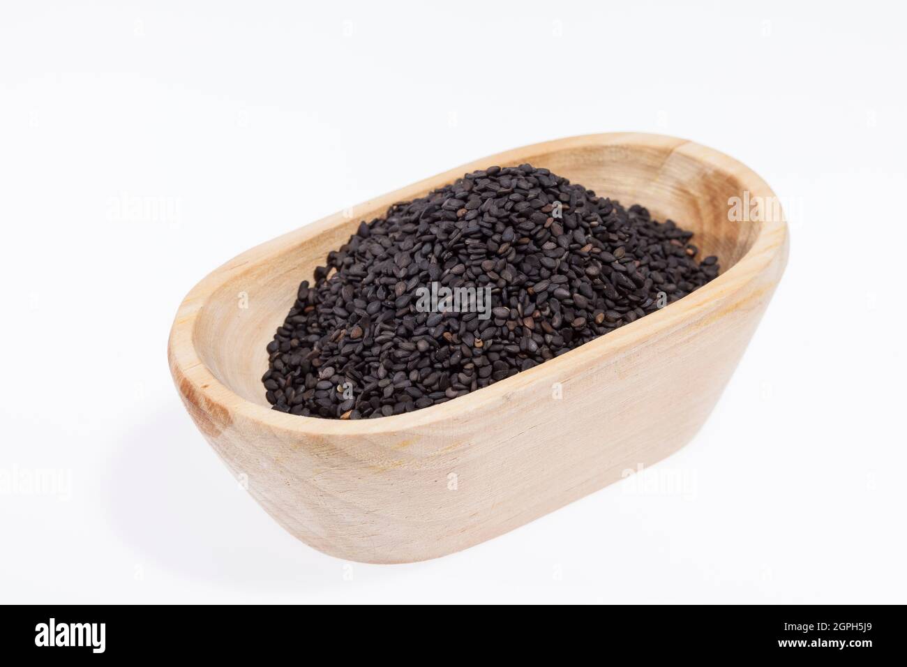 Graines biologiques noires de sésame - Sesamum indicum. Banque D'Images