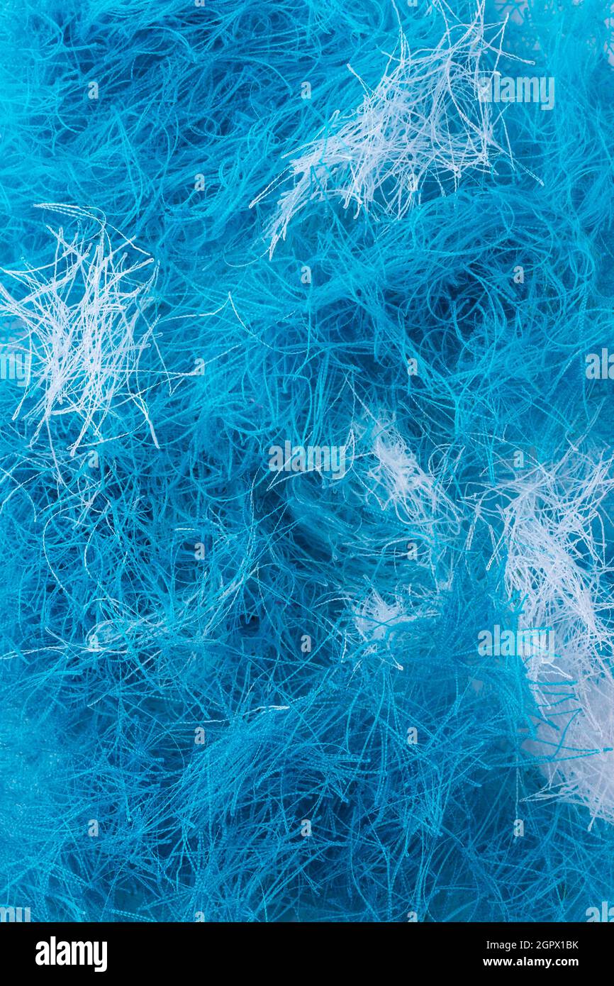 motif abstrait de fils enchevêtrés, texture d'arrière-plan bleu et blanc, gros plan Banque D'Images