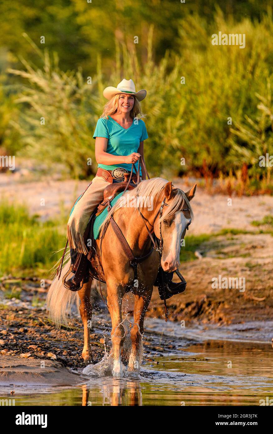 Équitation de cow-girl Banque D'Images