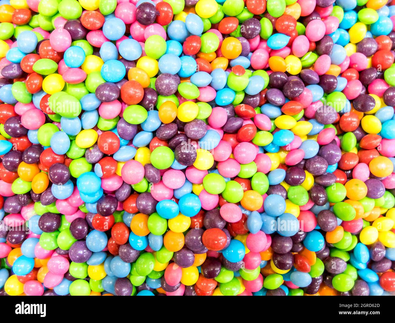 Des bonbons colorés comme arrière-plan, vue de dessus Banque D'Images