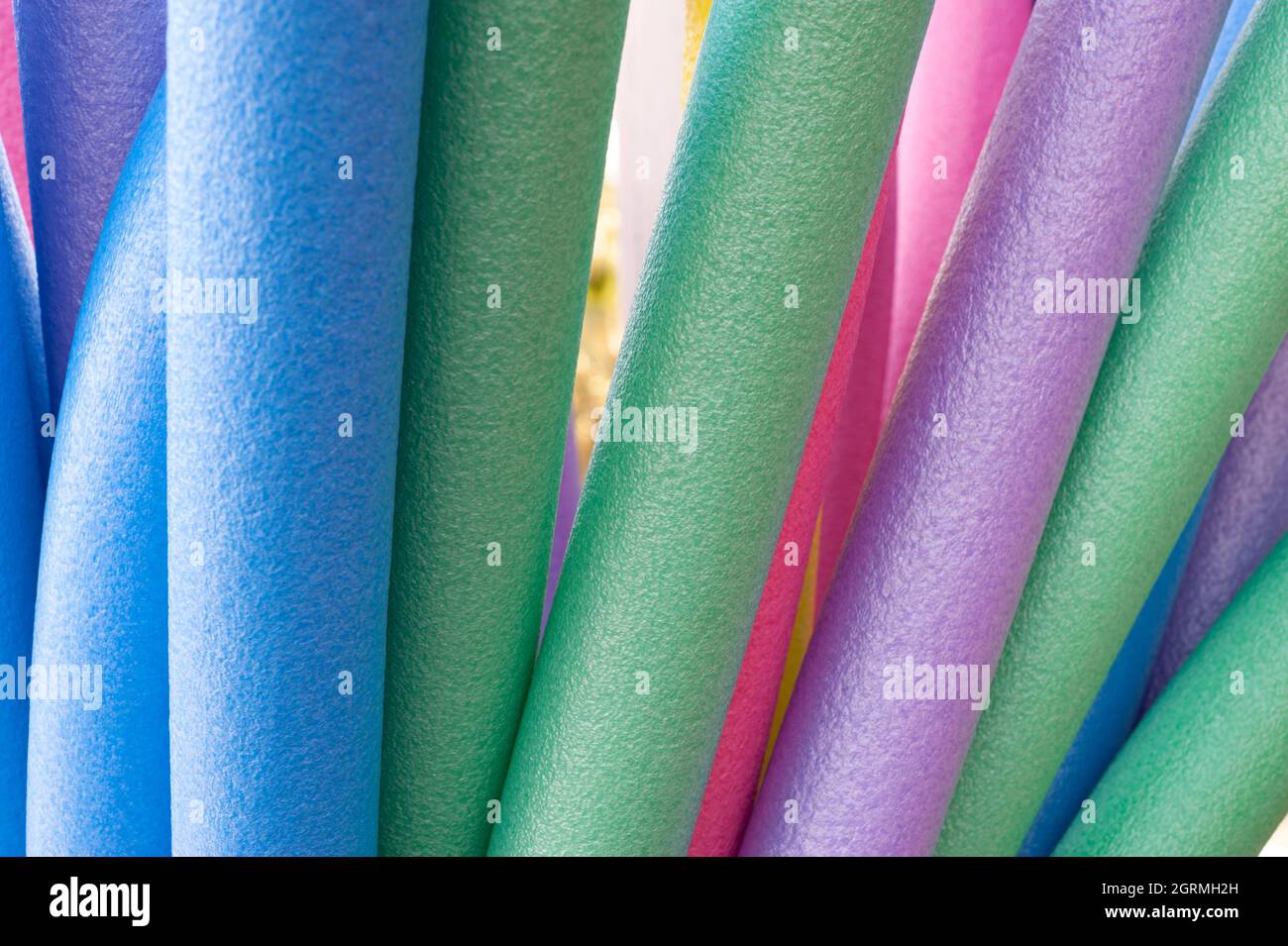 Tuyaux de jeu en plastique souple de couleur Banque D'Images