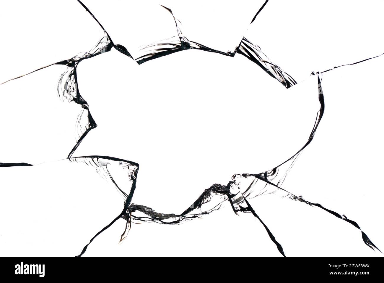 Collage de fissures dans le verre, un trou de balles dans le verre sur un fond blanc. Texture de verre de fenêtre. Banque D'Images