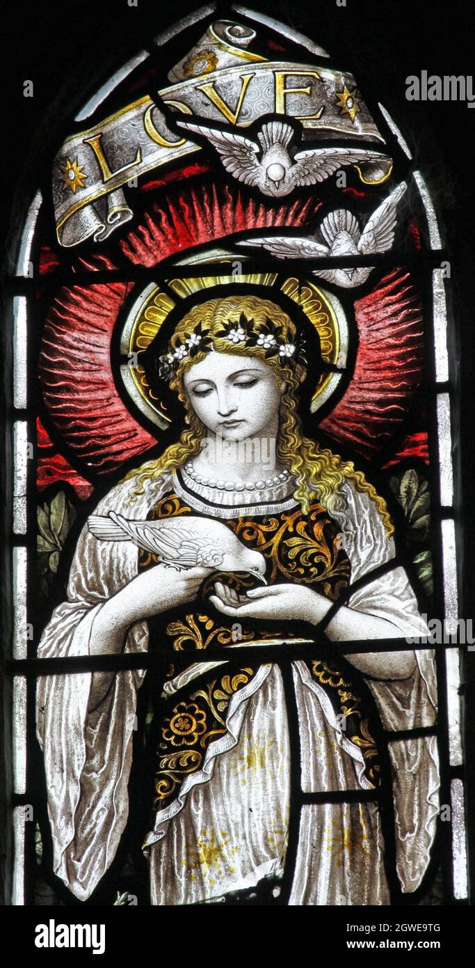 Une vitrail par Heaton Butler & Bayne de 1896 représentant l'Amour, l'église St James' Church, Newbottle, Northamptonshire Banque D'Images