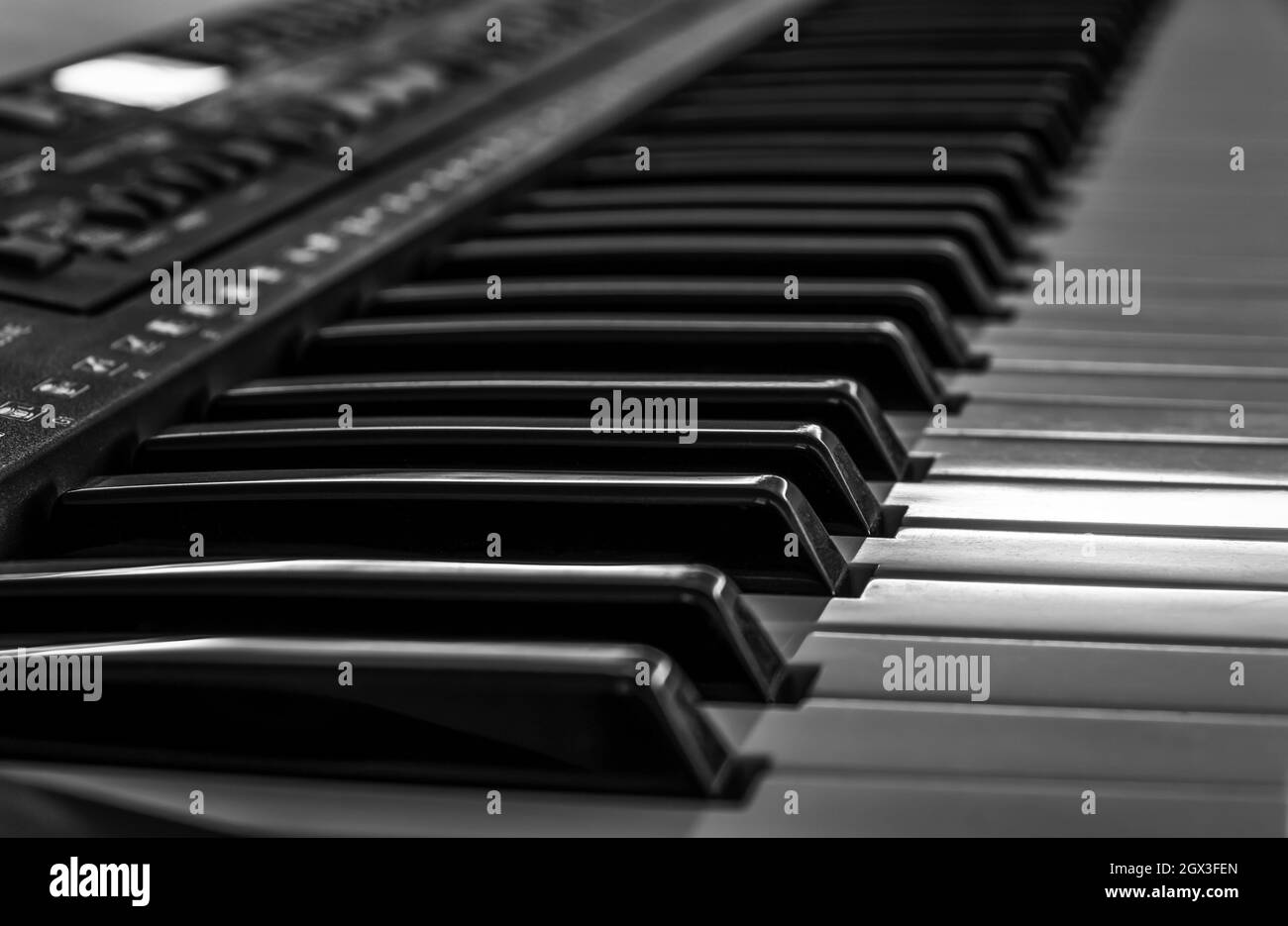 Gros plan sur les touches de piano noir et blanc. Banque D'Images