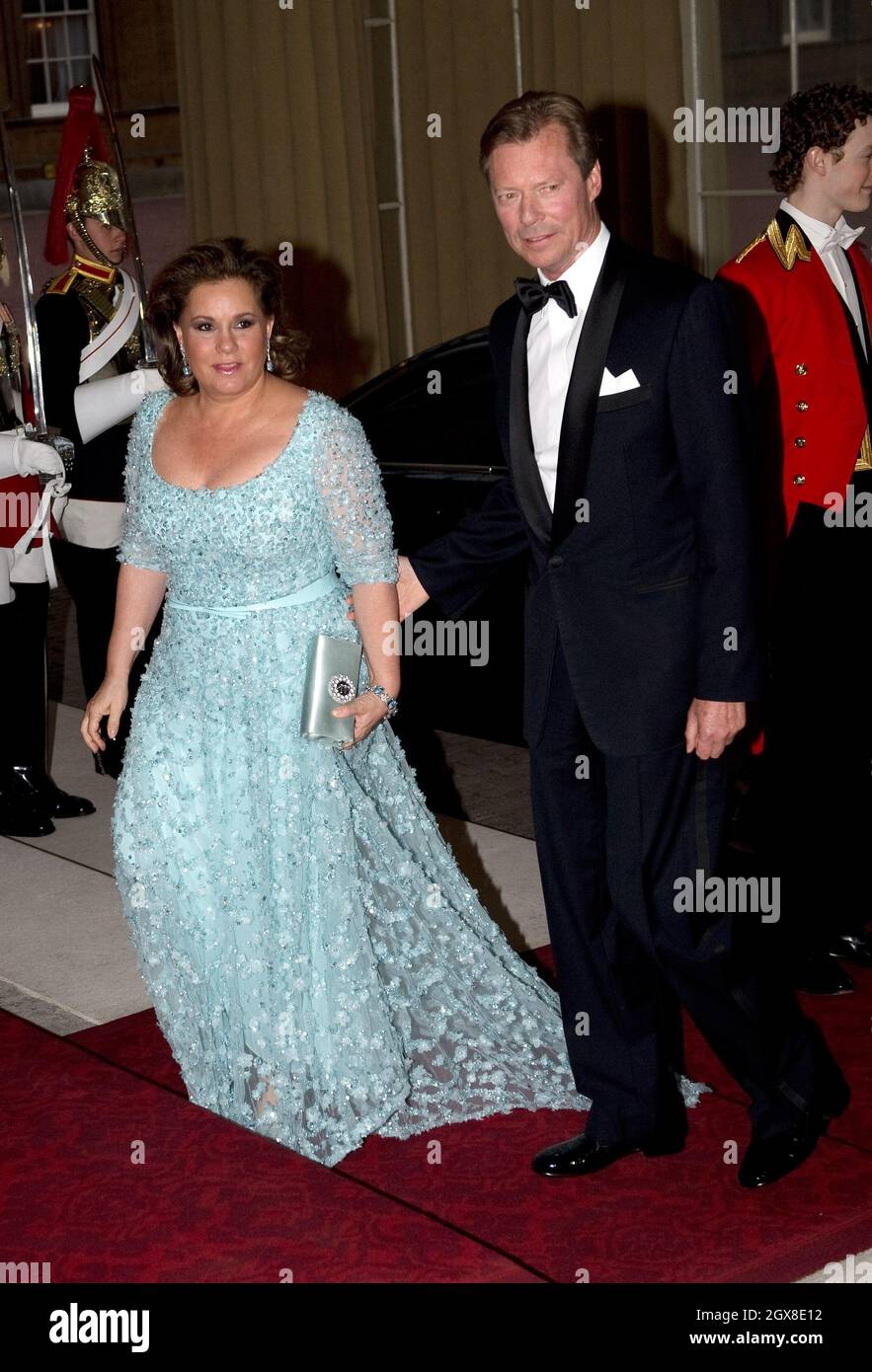 Le Grand-duc Henri et la Grande Duchesse Maria Teresa de Luxembourg assistent à un dîner pour les souverains étrangers organisé par le Prince de Galles et la Duchesse de Cornouailles pour commémorer le Jubilé de diamant de la Reine au Palais de Buckingham le 18 mai 2012. Banque D'Images