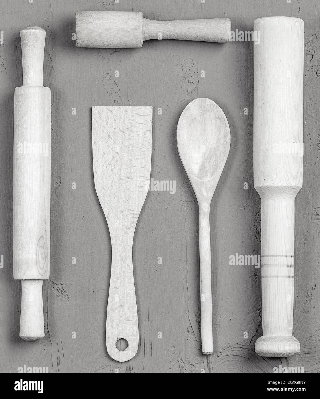 Les cuillères en bois, les spatules et un rouleau. Gros plan Banque D'Images