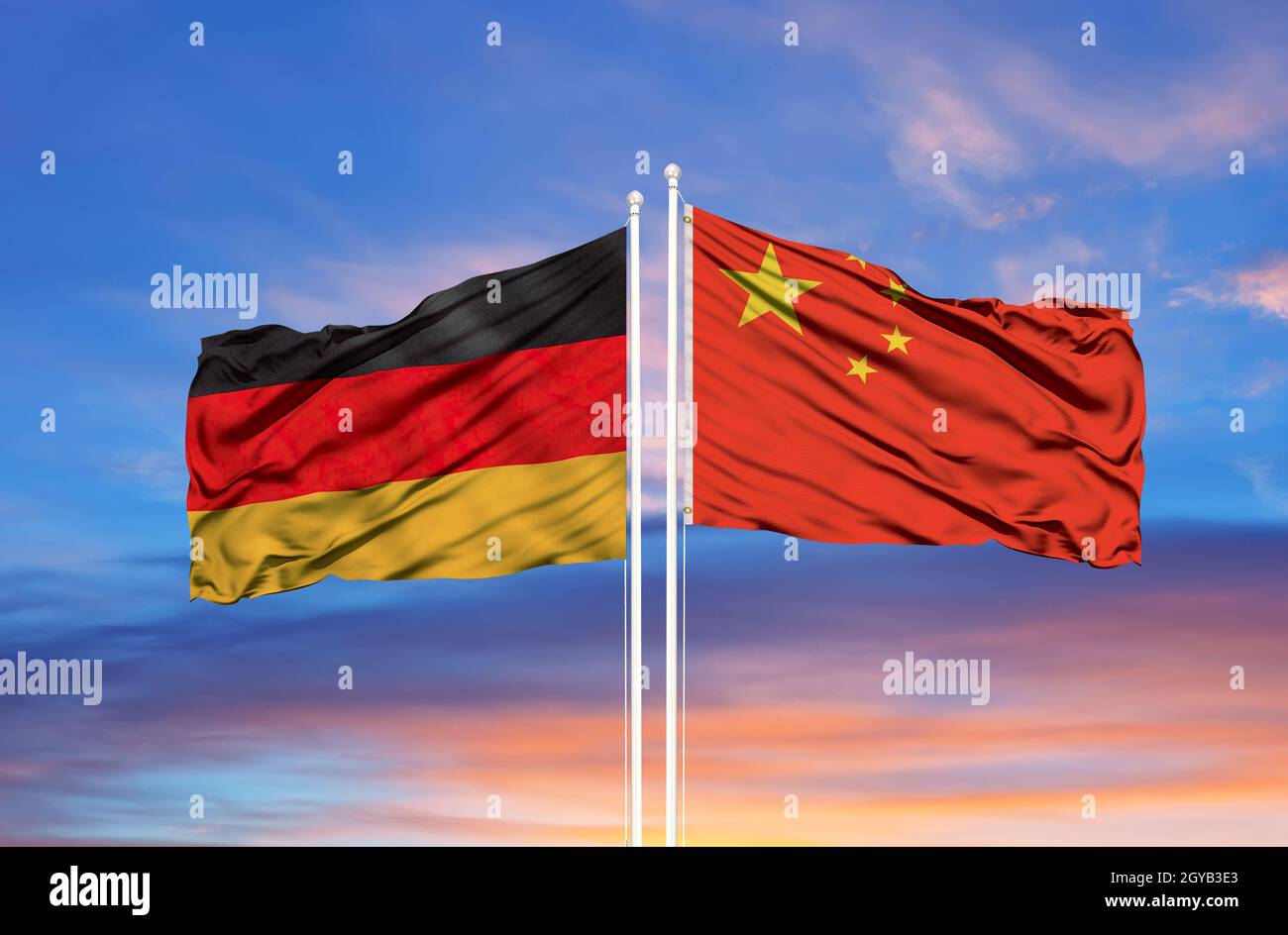 Drapeau allemand sur le drapeau de la chine Banque de photographies et