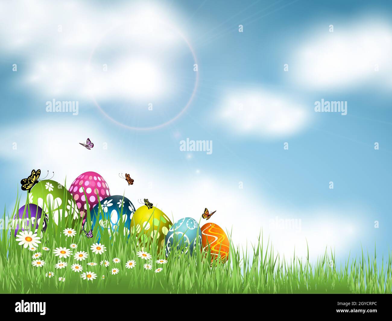 Oeufs de Pâques niché dans l'herbe contre un ciel bleu avec des papillons Banque D'Images Oeufs de Pâques niché dans l'herbe contre un ciel bleu avec des papillons Banque D'Images