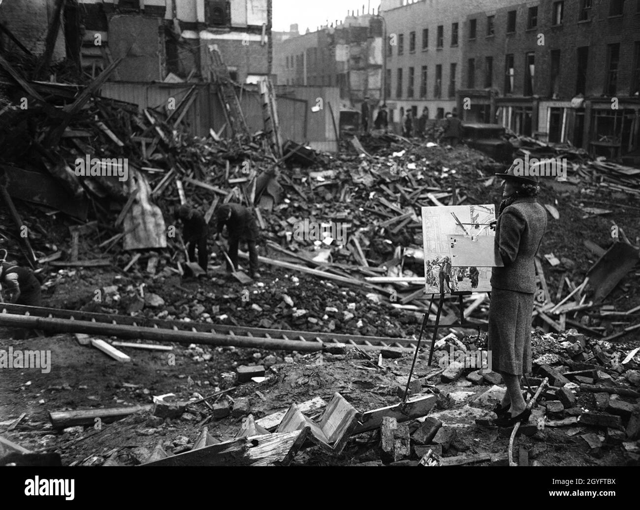 L'artiste Ethel Gabain, commandé par le ministère de l'information, peint les dégâts causés par la bombe à Londres pendant le Blitz, Angleterre 1940. Banque D'Images