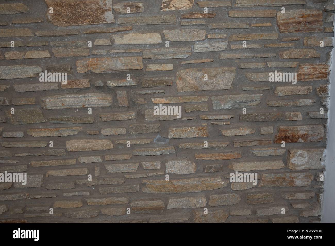 Vieux mur de briques d'une pierre Banque D'Images