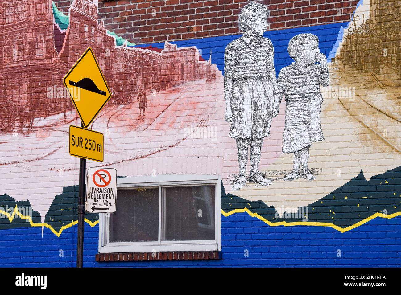 Panneau de rue et murale français dans la région du plateau Mont-Royal, Montréal Canada Banque D'Images