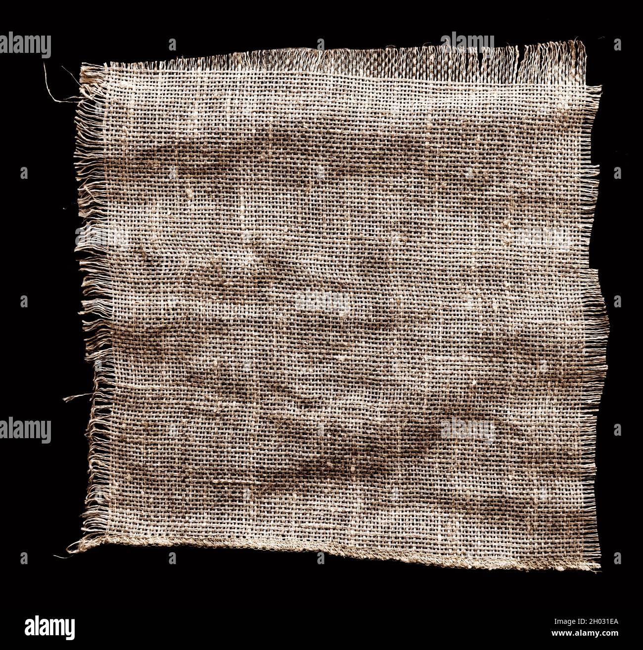 Morceau de tissu de sackCloth sur fond noir Banque D'Images