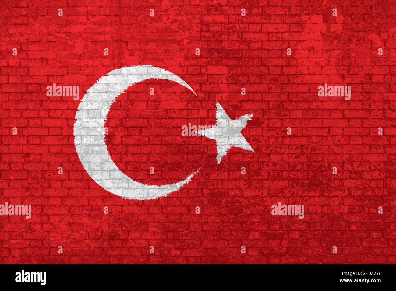 Mur de briques peint avec le drapeau national plat de la Turquie. Couleur rouge avec étoile et demi-lune, fond 3D.Concept de barrières sociales de Banque D'Images