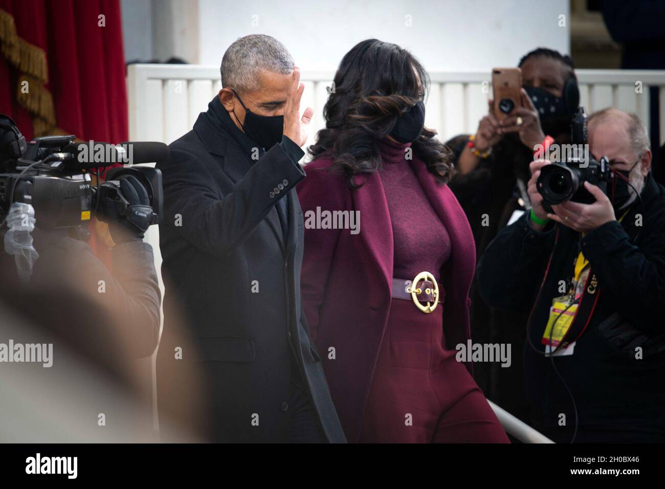 L'ancien président Barack Obama et sa femme Michelle assistent à la 59e cérémonie d'investiture présidentielle à Washington, le 20 janvier 2021.Le président Joe Biden et le vice-président Kamala Harris ont prêté serment sur le front ouest du Capitole des États-Unis. Banque D'Images