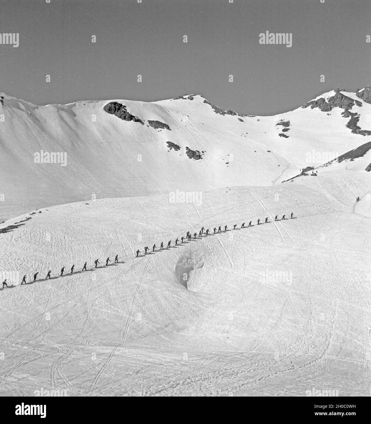 Gebirgsjäger in einem Skigebiet in Bayern, Deutsches Reich 1930er Jahre. L'infanterie de montagne dans une région de ski en Bavière, Allemagne, 1930. Banque D'Images