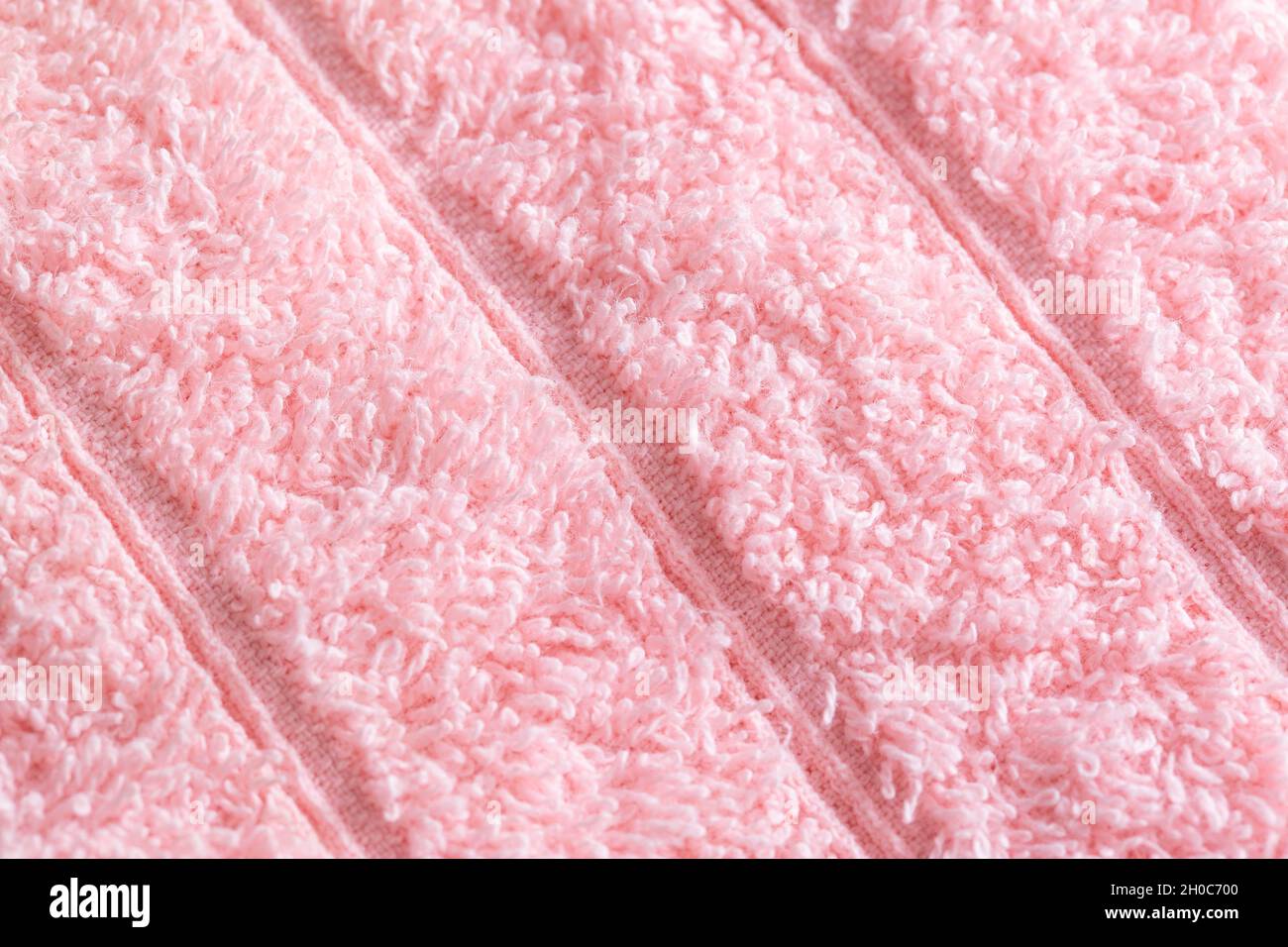 Tissu de fond texturé avec pieu. Tissu doux rose, macro, décoratif Banque D'Images Tissu de fond texturé avec pieu. Tissu doux rose, macro, décoratif Banque D'Images