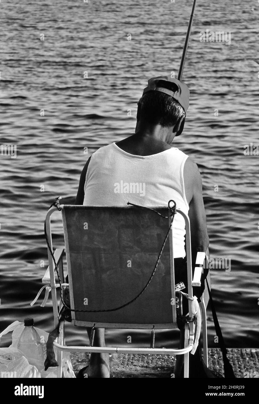 Street Photography, Imperia, Italie, 2003, Fisherman. Banque D'Images