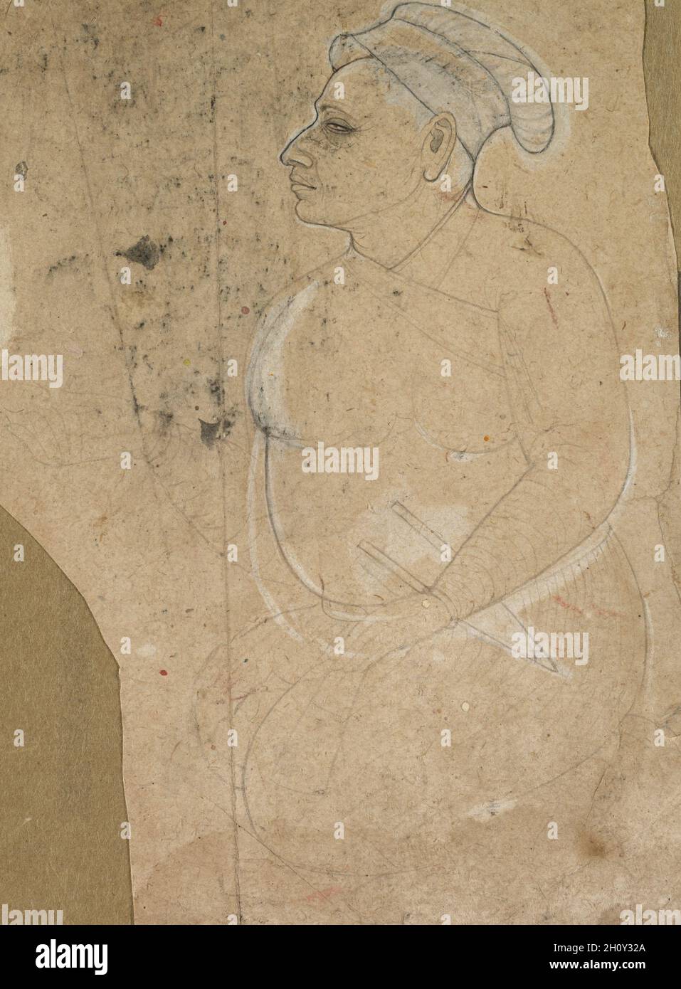 Portrait d'un homme vieillissant, c.1700. Nord de l'Inde, Himachal Pradesh, Guler.Encre et pigment blanc opaque sur papier ; total : 18 x 13.3 cm (7 1/16 x 5 1/4 po).Ce portrait sensible survit comme un fragment, faisant partie d'une étude pour une plus grande peinture.La tunique moghole de cet homme, avec un poignard de katar caché dans la ceinture, indique qu'il est noble, probablement hindou, parce que la tunique est attachée sous le bras gauche.Le geste de sa main droite, juste un fantôme d'une indication, et les lèvres légèrement parties suggèrent qu'il fait une demande.Sa position verticale révèle une force intérieure et une dignité malgré la fa Banque D'Images