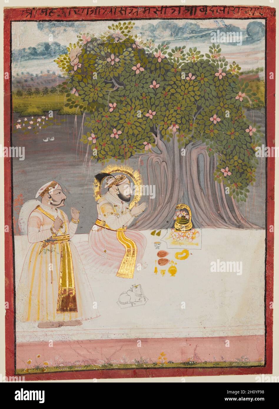 Maharana Sangram Singh II (r.1710–34) adorant un Linga sous un Banyan Tree, c.1712-15.Nord-Ouest de l'Inde, Rajasthan, Rajput Royaume de Mewar.Aquarelle opaque, encre et or sur papier; page : 24.8 x 18.1 cm (9 3/4 x 7 1/8 po.); miniature : 23.2 x 16.8 cm (9 1/8 x 6 5/8 po.).Le roi s'agenouille dans le culte d'un ancien sanctuaire d'arbres sur les rives d'un lac.De tels sanctuaires étaient souvent associés à des déités serpents, et un serpent à quatre têtes peint en or est enveloppé autour de la linga, l'emblème phallique marquant la présence sacrée du dieu Shiva.Fleurs, paquets de paan (noix d'arec et sucreries Banque D'Images