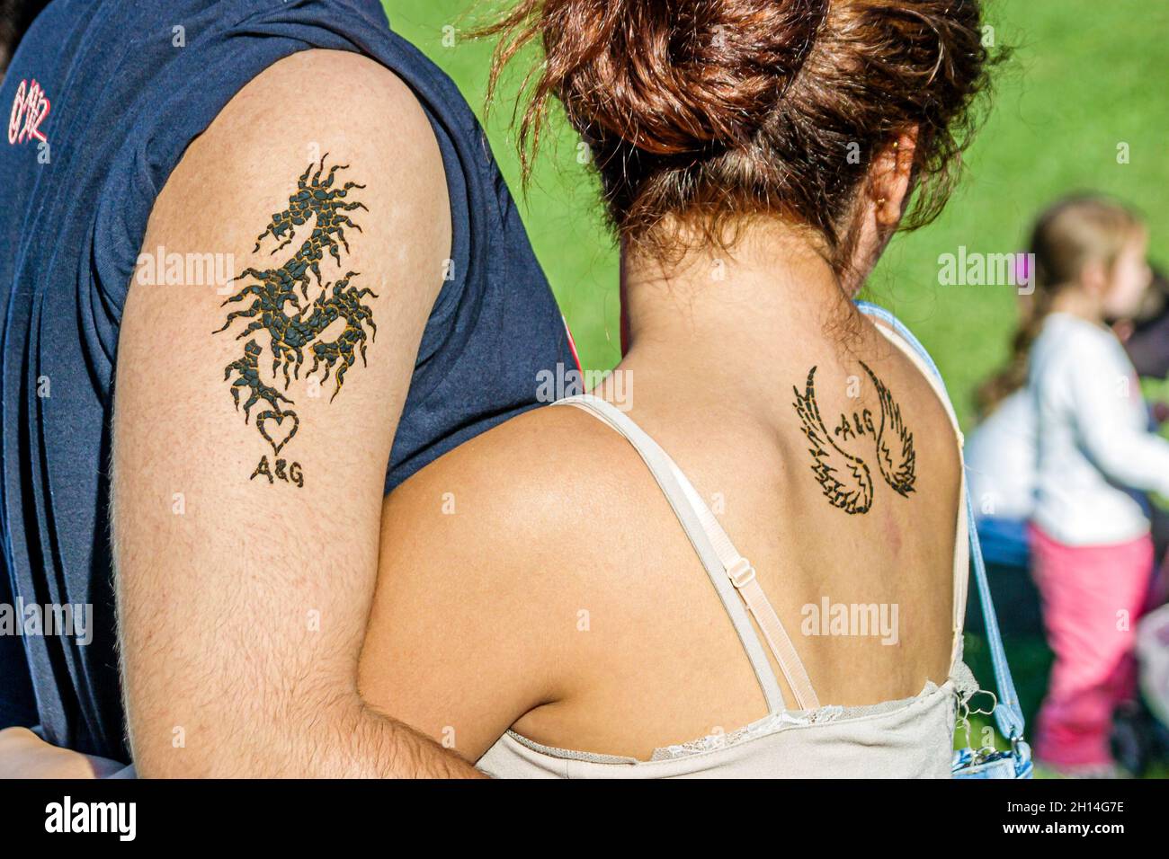 Miami Florida, Tamiami Park, Harvest Festival, couple homme homme femme femme femme tatouages Banque D'Images