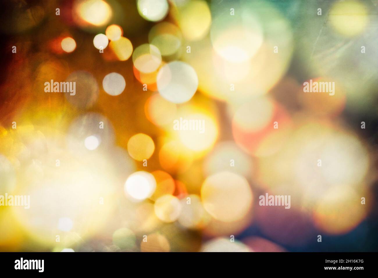 Toile de fond lumineuse des fêtes.Fond de Noël festif.Arrière-plan abstrait élégant avec lumières et étoiles de bokeh Banque D'Images