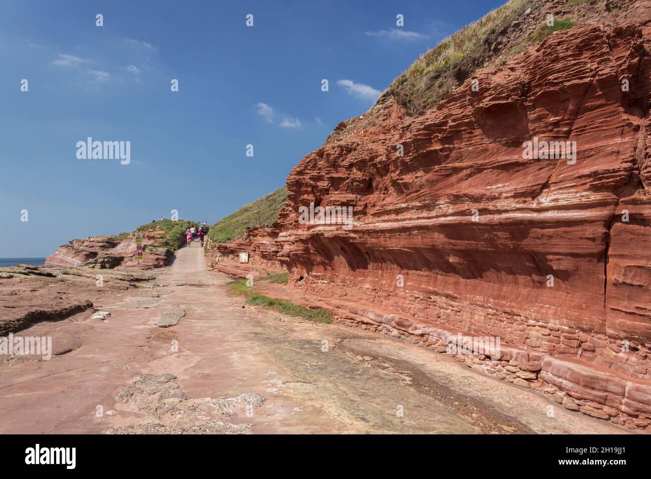 Île Hilbre, Royaume-Uni : roche de grès rouge exposée sur l'île principale. Banque D'Images