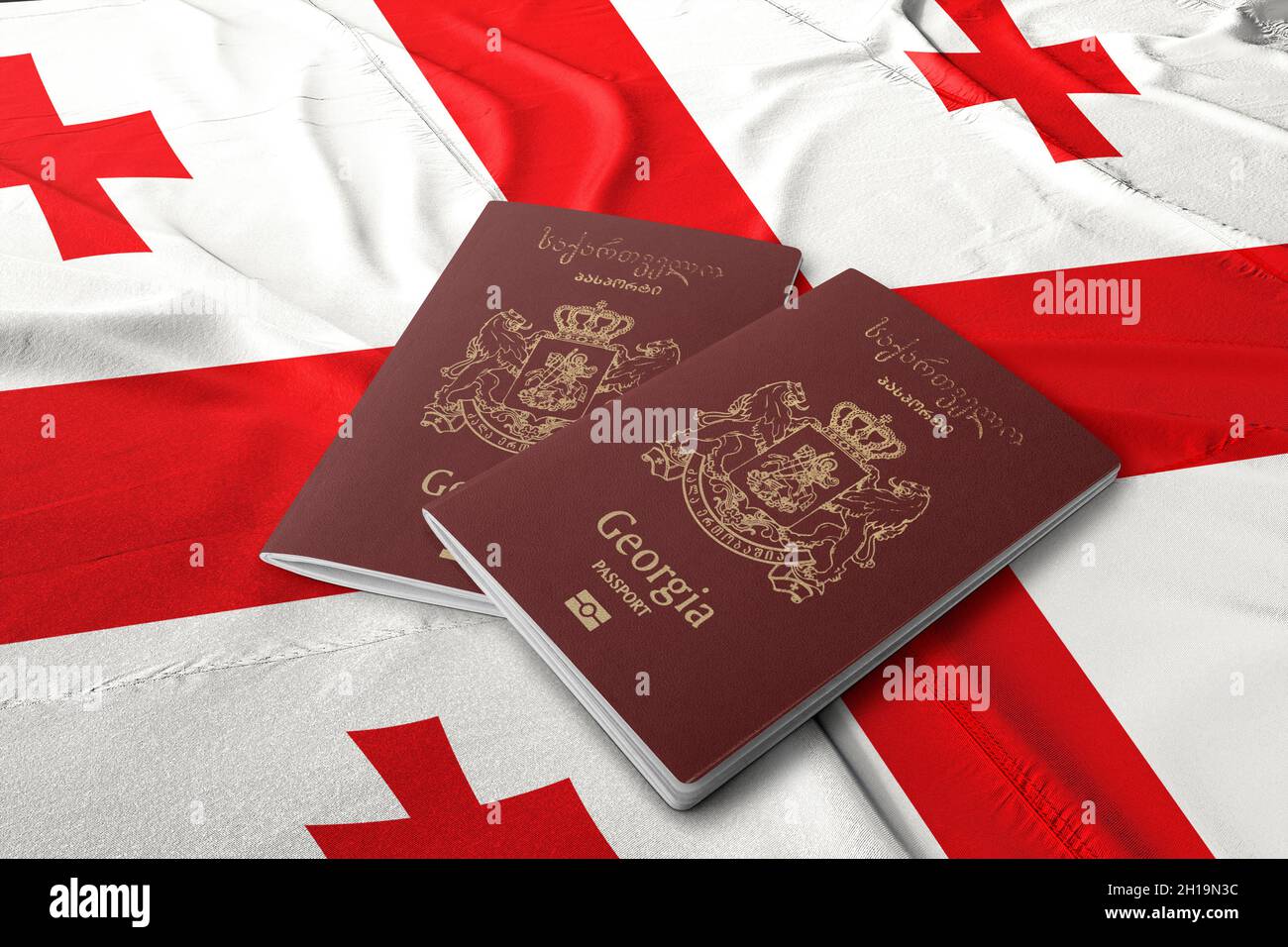 Passeport géorgien sur le drapeau de la Géorgie Banque D'Images