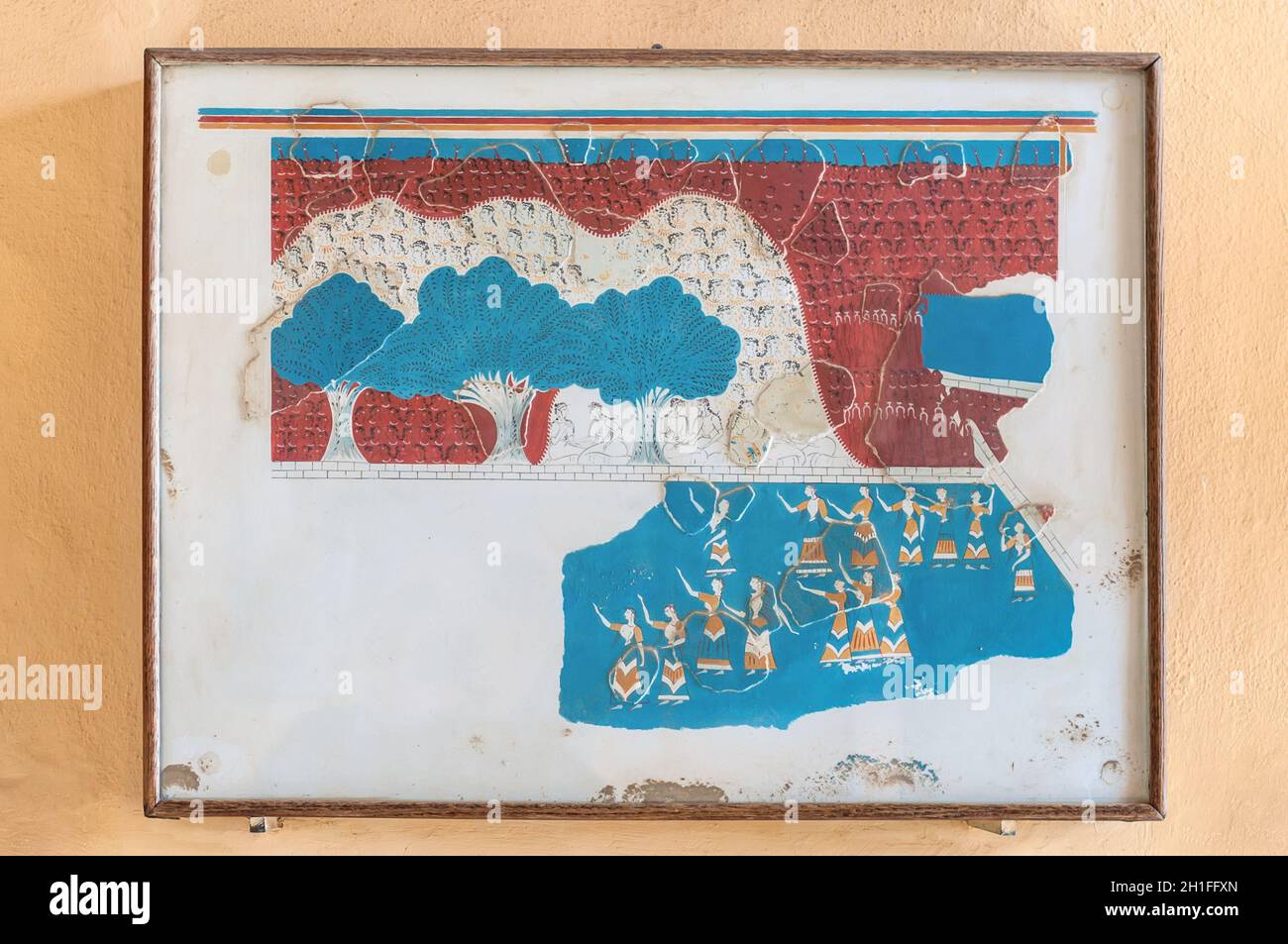 Knossos, Grèce - Novembre 2, 2017 : fresque encadrée sur le mur du palais de Knossos. C'est le plus grand site archéologique de l'âge du bronze sur la Crète. Banque D'Images