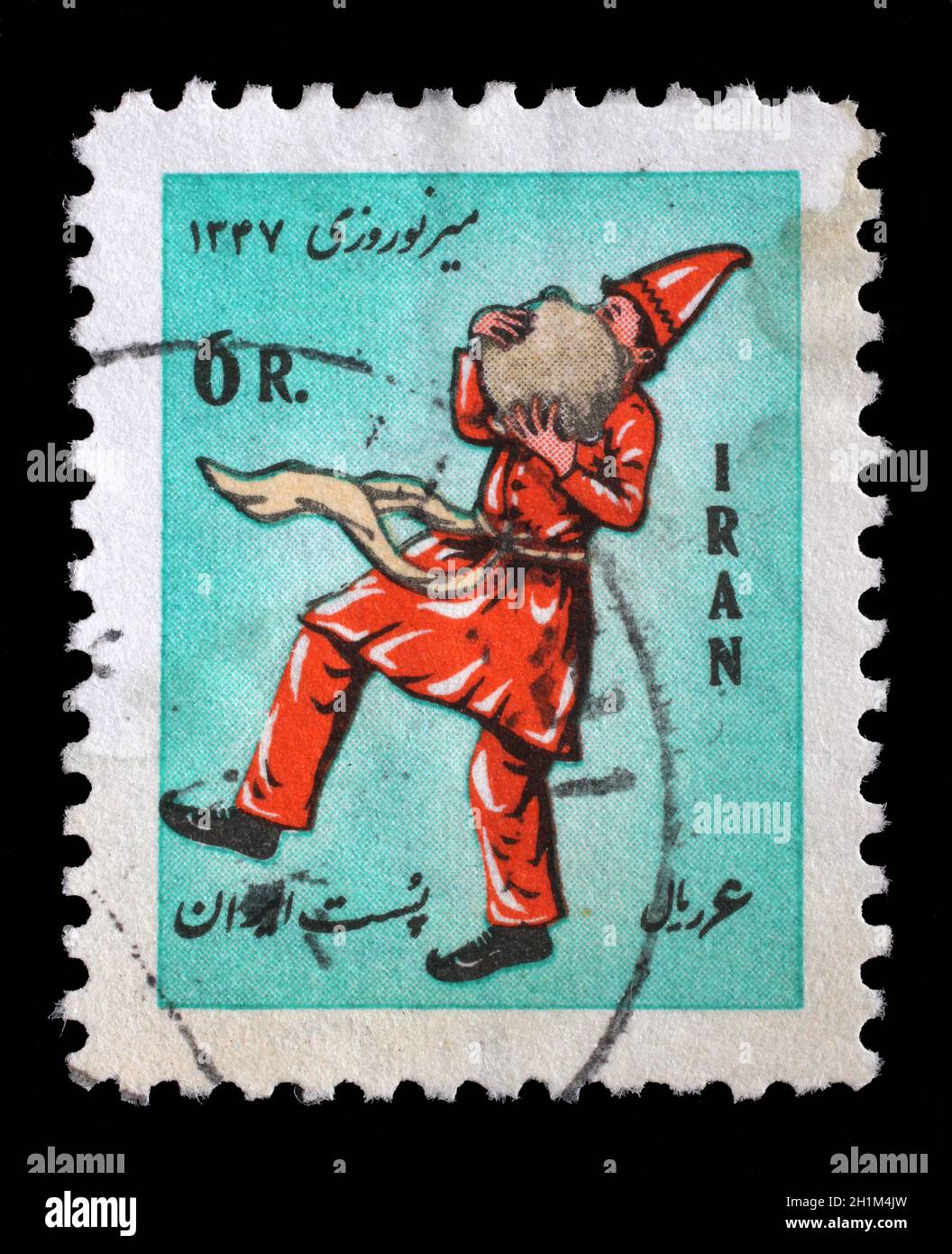 Timbre émis en Iran montre musicien avec hochet, Nouvel an Iranien et premier jour du printemps, vers 1973. Banque D'Images