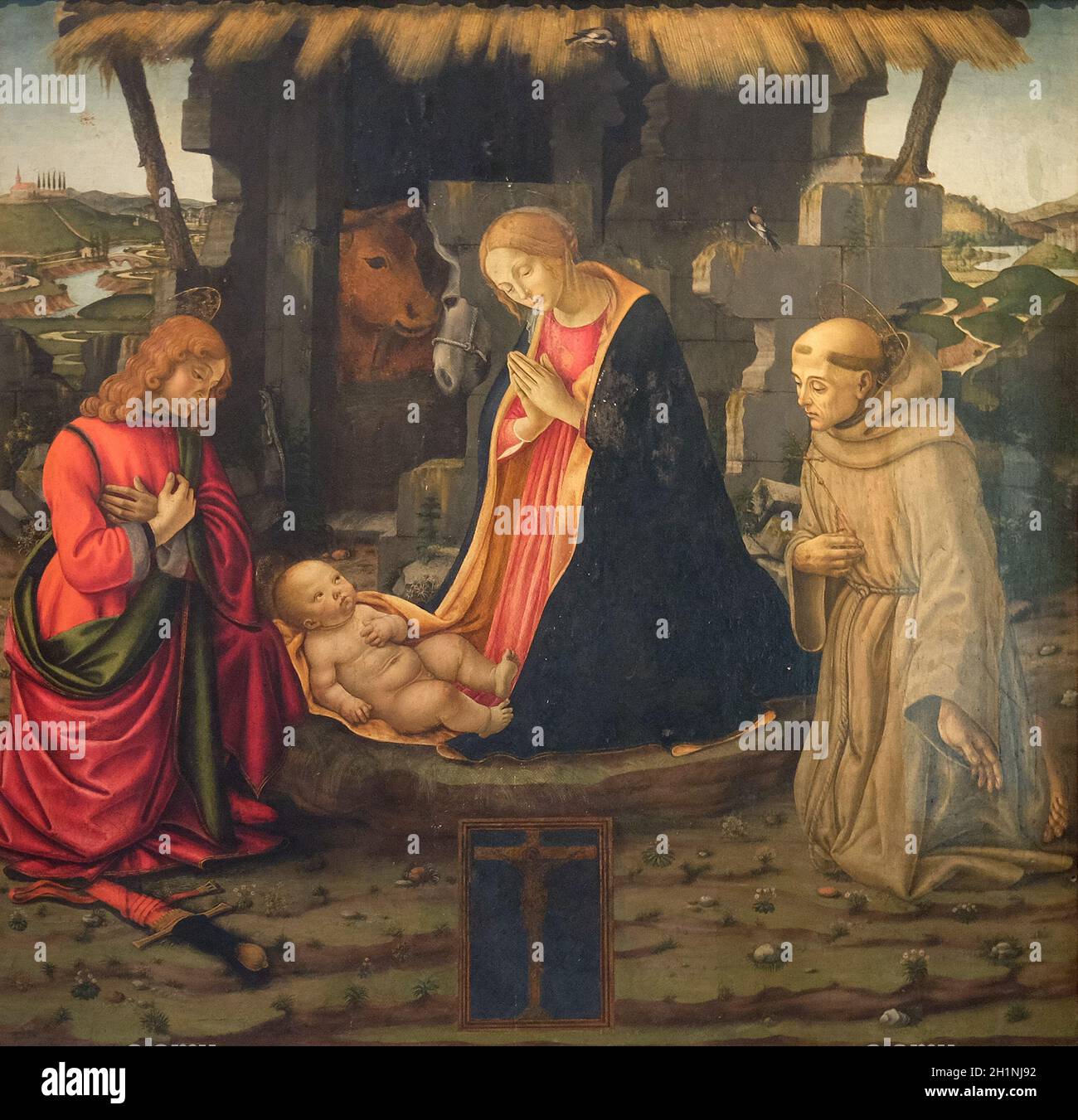 Scène de la nativité avec les saints Julien et Francis, de l'École de Domenico Ghirlandaio la basilique San Lorenzo à Florence, Italie Banque D'Images