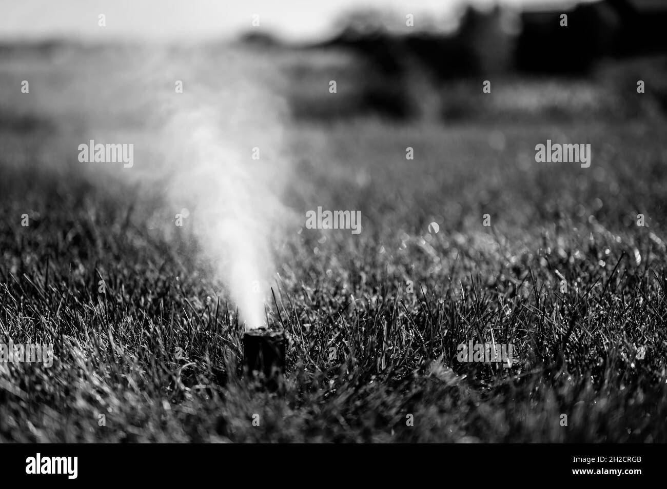 préparation pour l'hiver d'un système de gicleurs d'irrigation en soufflant de l'air sous pression pour éliminer l'eau Banque D'Images