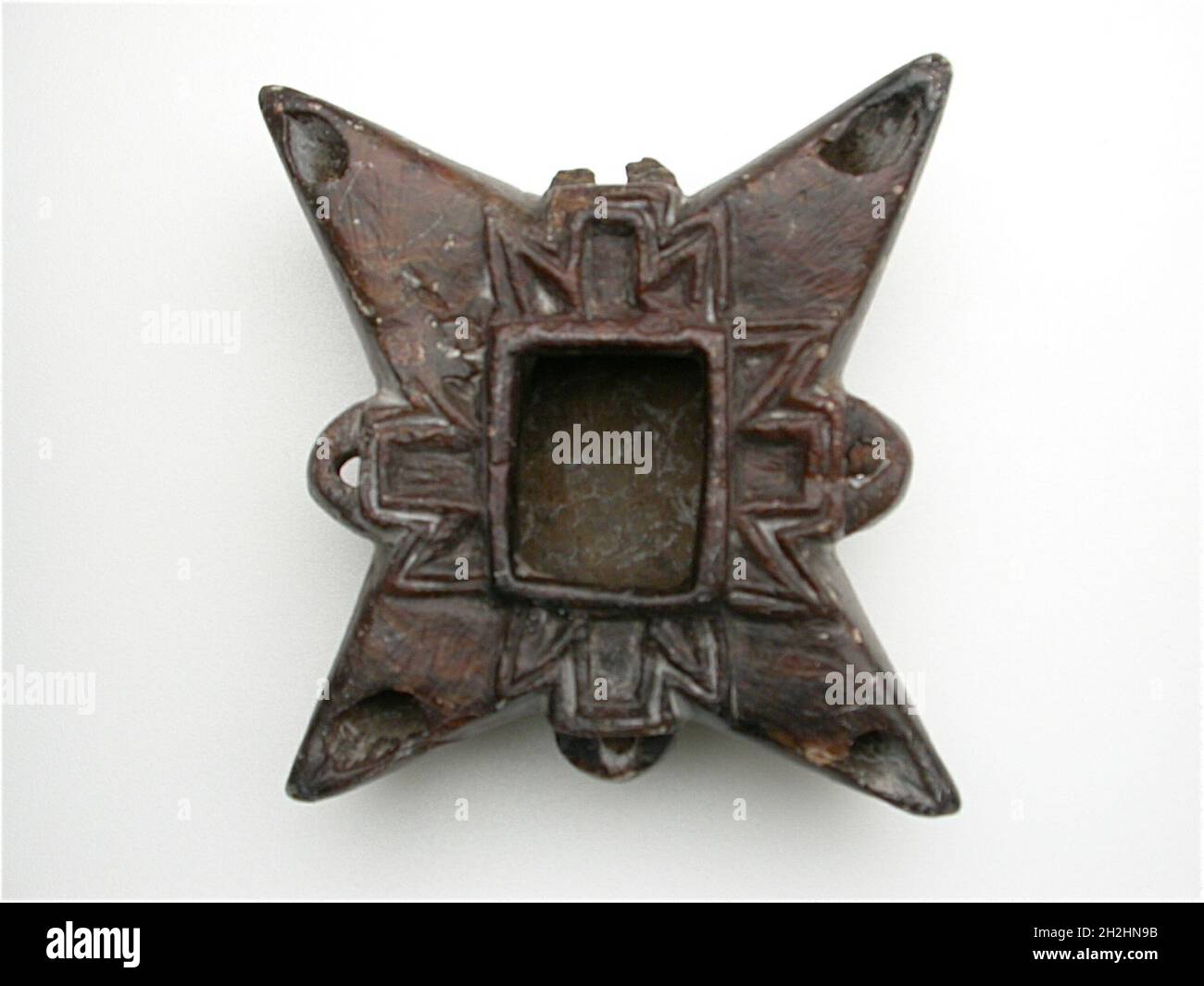 Lampe en forme d'étoile à quatre pointes, Égypte, période copte (4e-7e siècle après J.-C.). Banque D'Images