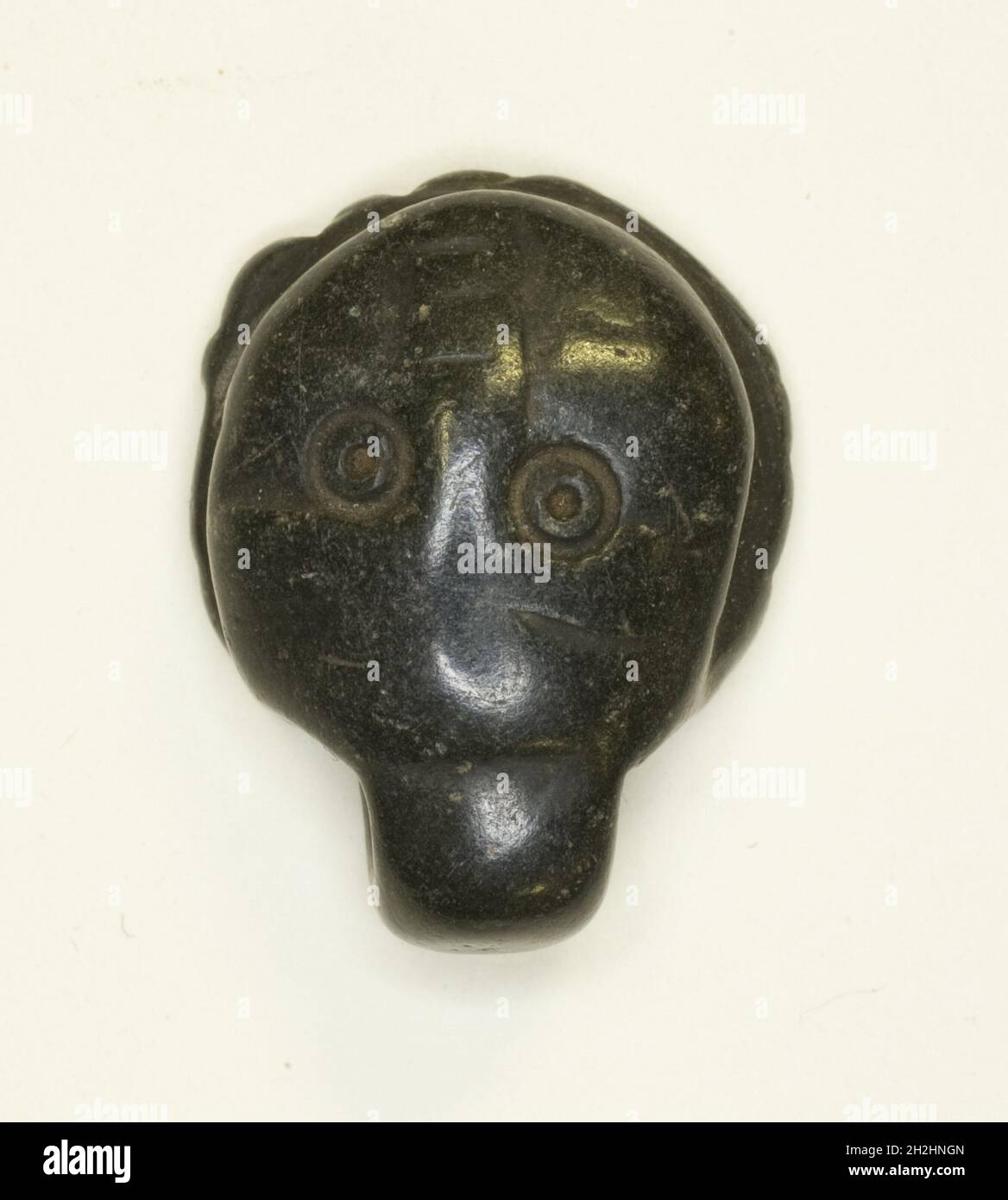 Face Amulet, Égypte, période copte (4e-7e siècle après J.-C.). Banque D'Images